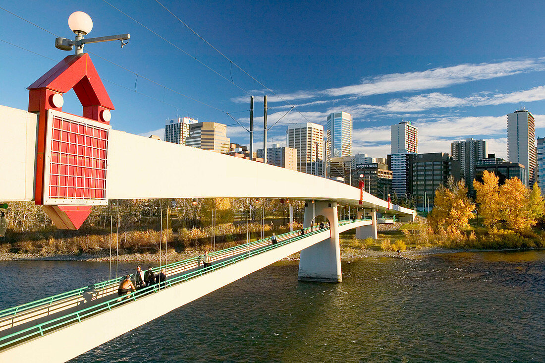 Pedestrian bridge, view from Kensington along Bow River, downtown Calgary. Alberta, Canada