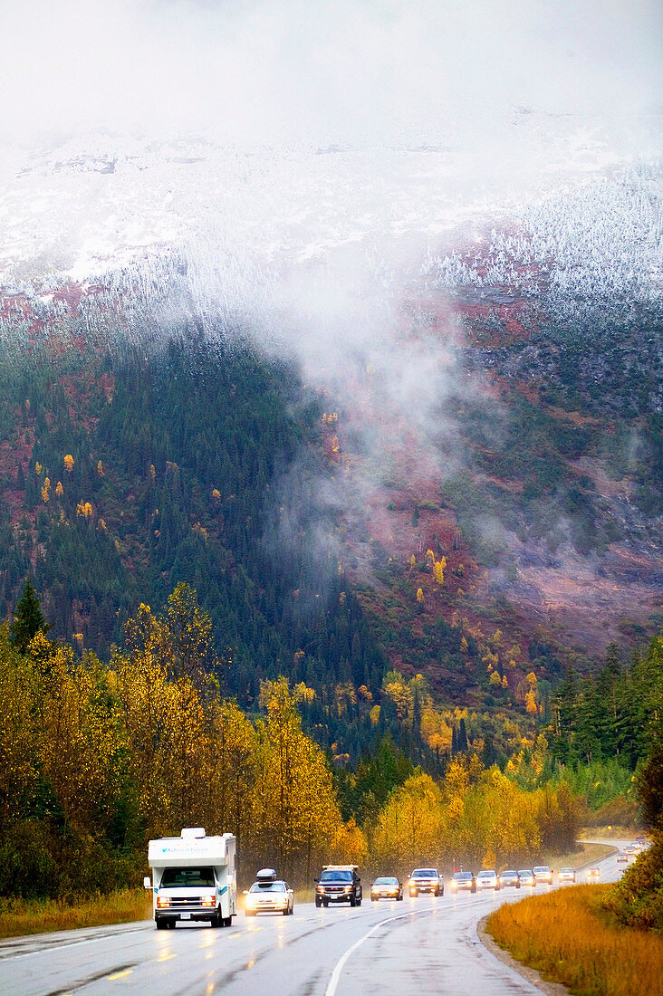 Trans-Canada highway traffic in autumn. Glacier National Park. Rogers Pass, British Columbia, Canada