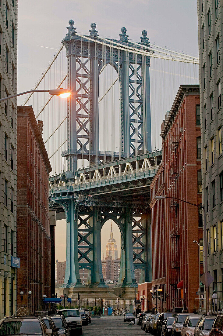 Evening view of Manhattan bridge and Empire State Building from Washington street. Manhattan. New York city. USA.