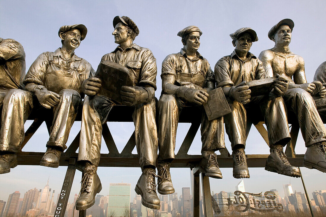 Iron workers sculpture by Sergio Furnari and New York City view. Long Island city. Queens. New York city. USA.