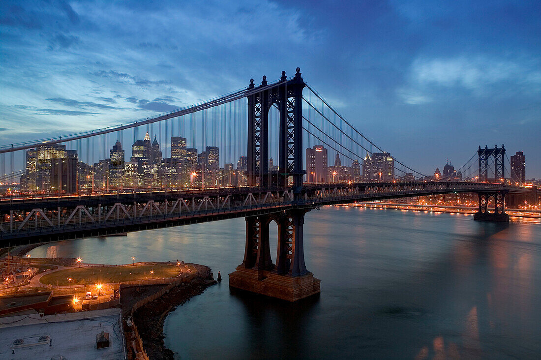Aerial view from Brooklyn at dusk. Manhattan and Brooklyn bridges and Lower Manhattan. New York city. USA.