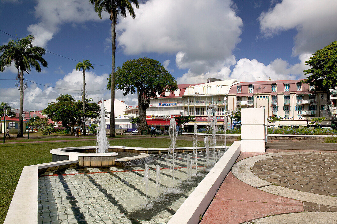 French West Indies (FWI), Guadeloupe, Grande Terre Island, Pointe-a-Pitre: View of park Fountain / Place de la Victoire
