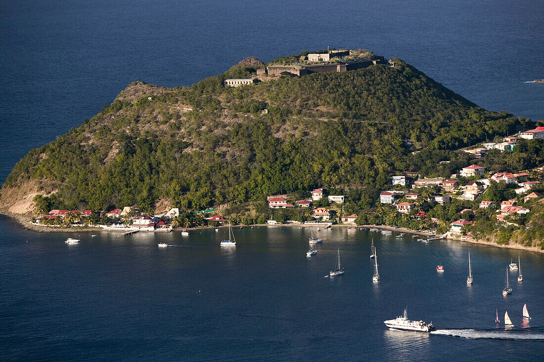 French West Indies (FWI), Guadeloupe, Les-Saintes Islands, Terre-de-Haut: Bourg Des Saintes & Fort Napoleon from Le Chameau Peak (309 meters)
