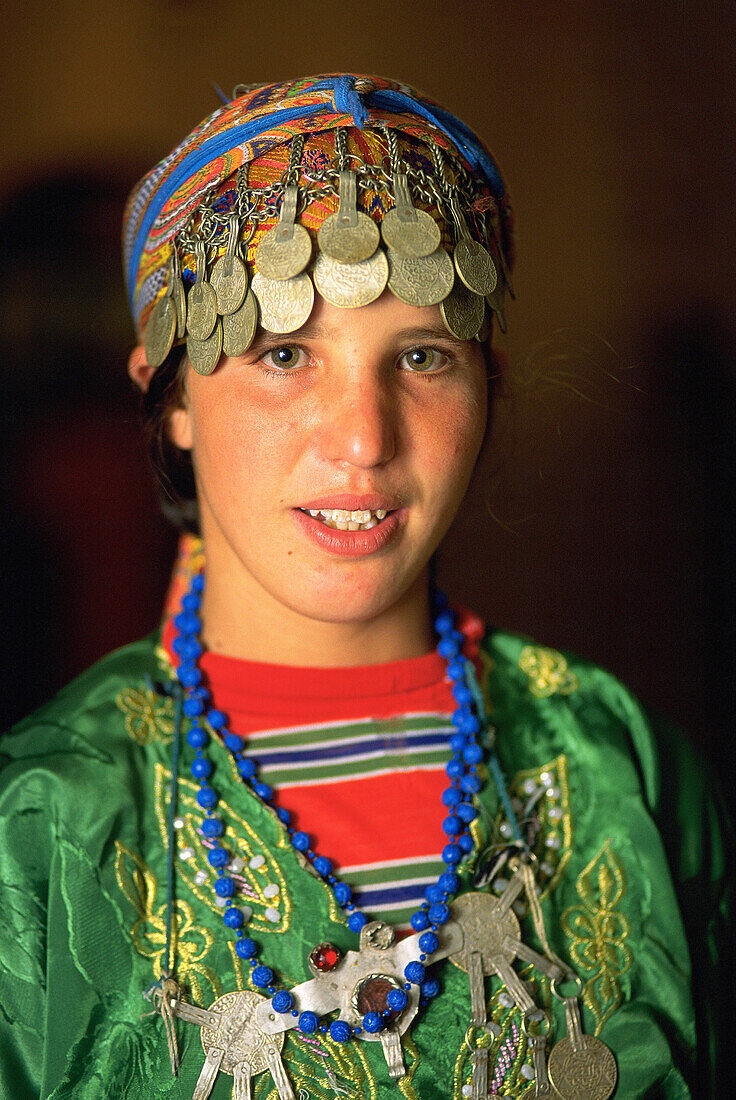 Berber young woman with coins crown, Marrakech, Morocco