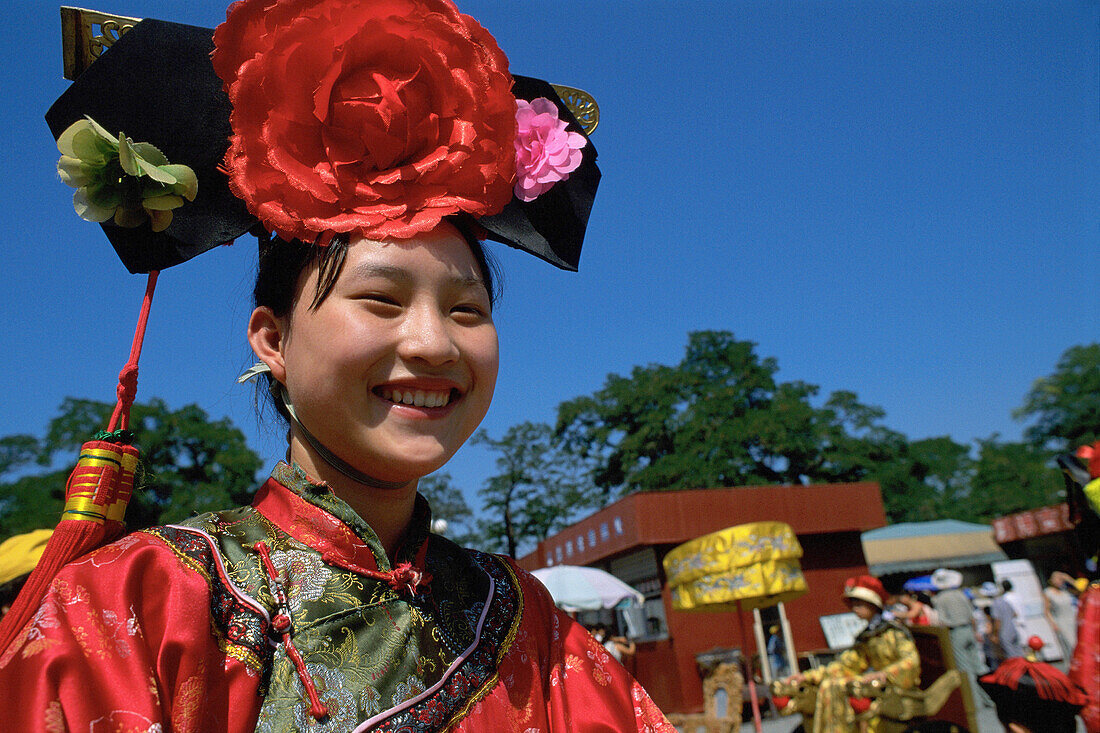Girl in traditional costume. Beijing. China