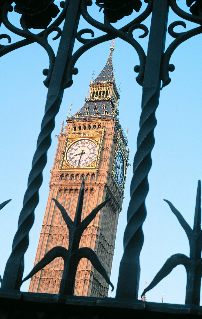 Ornate iron fence and Big Ben. London. England