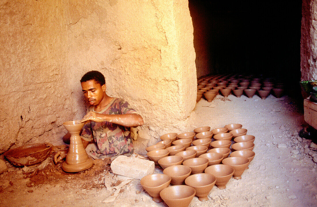 Potter at work. Dades Valley. Morocco