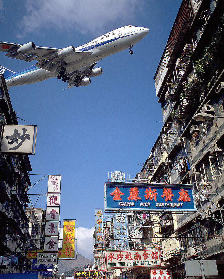 Aircraft approaching Kai Tak International Airport. Kowloon. Hong Kong