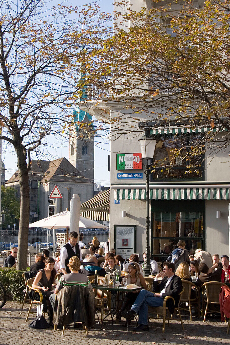 Switzerland,Zurich, Cafe Molino,street cafe, background Fraumunster