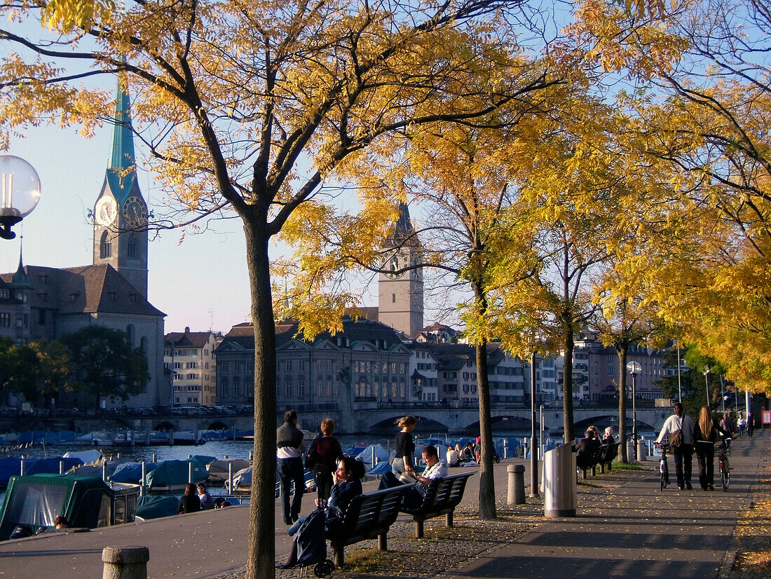Switzerland Zuerich, Promenade,  Limmat, Framunster, St. Peters church autumn