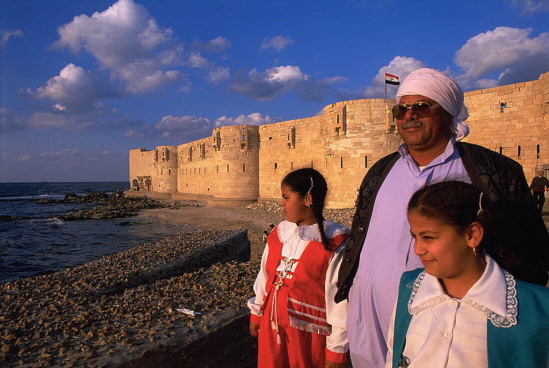 Alexandria turkish fortress, father and daughters at fore. Egypt