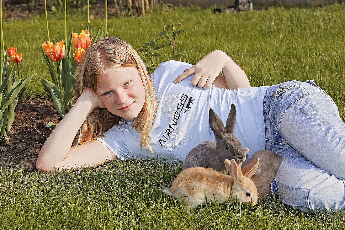 Girl with rabbits