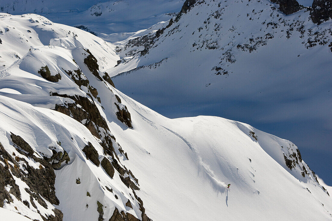 Female skier freeriding, Gemsstock skiing region, Andermatt, Canton Uri, Switzerland