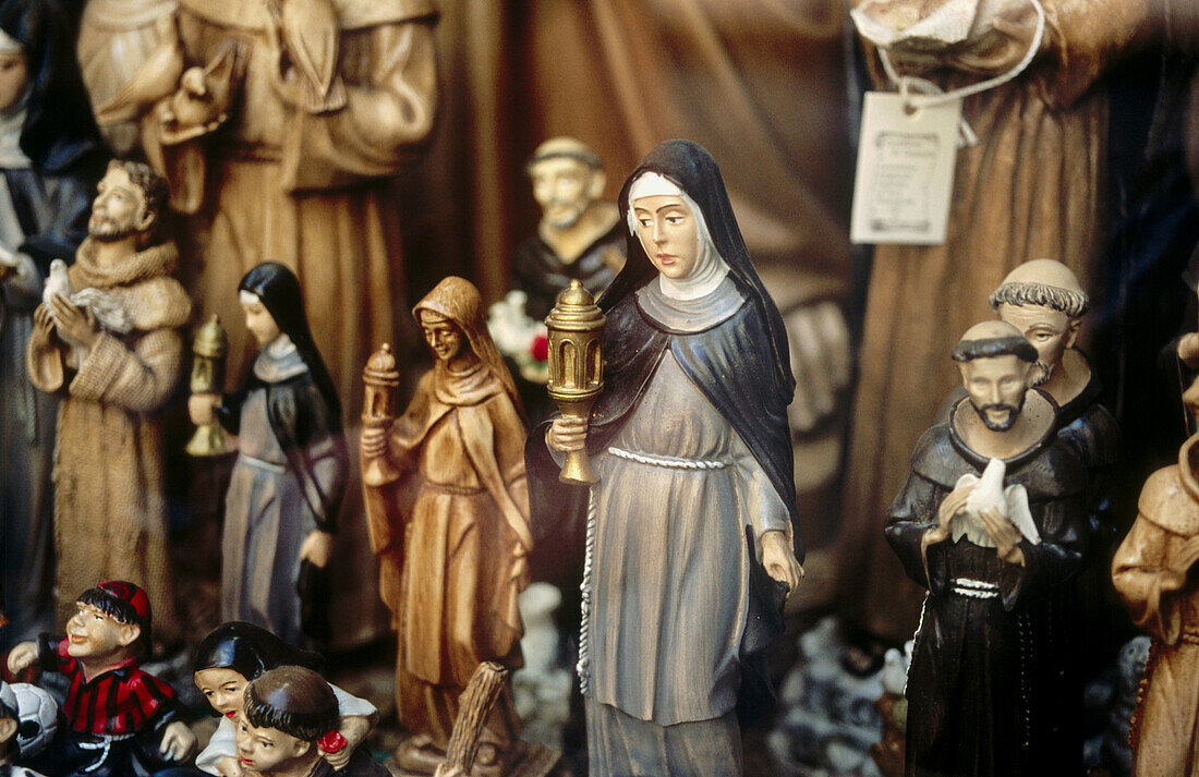 Religious statuettes for sale, Assisi. Umbria, Italy