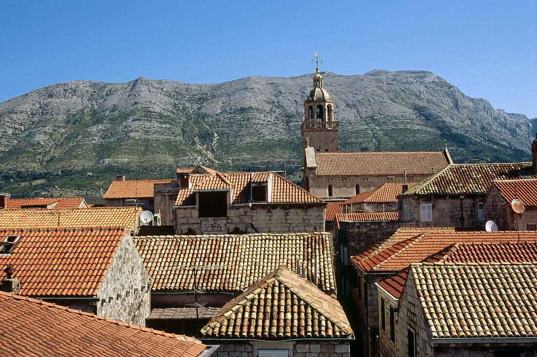 Tower of the cathedral and rooftops, town of Korkula. Korcula Island, Dalmatia. Croatia