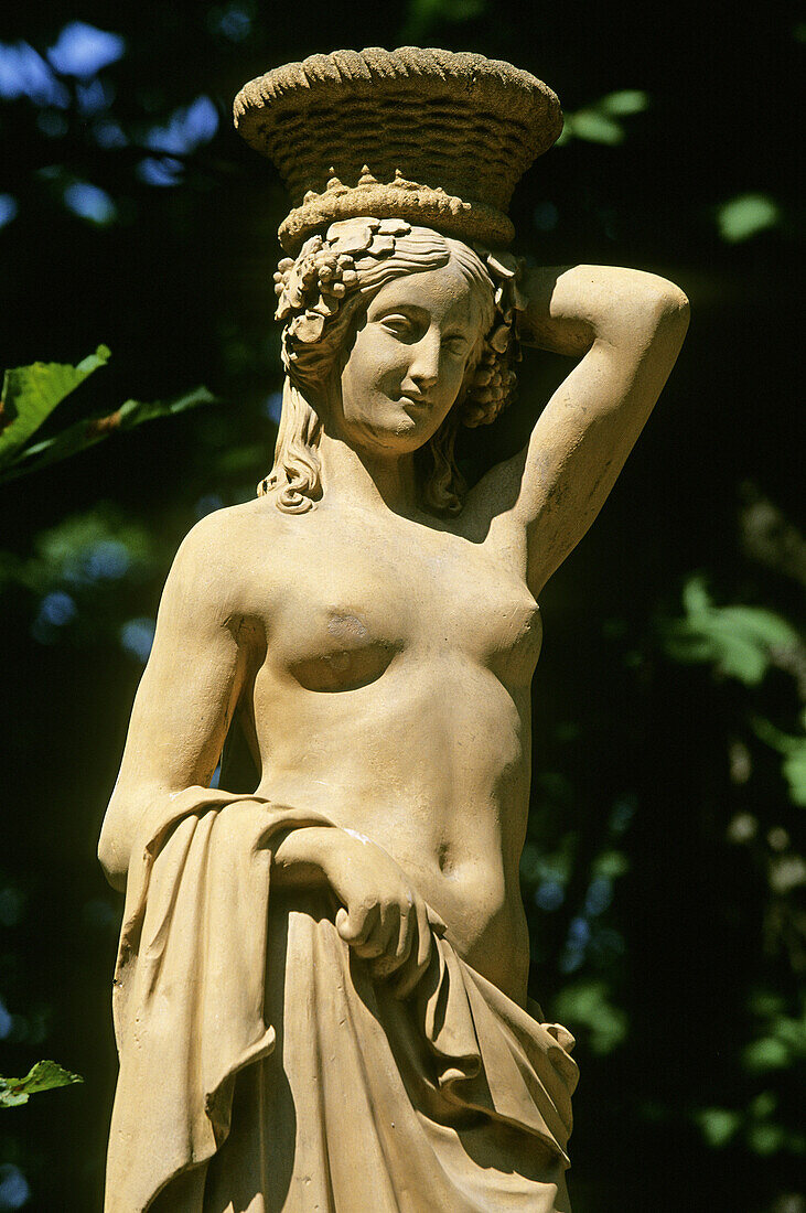 Statue in the gardens of Wilanów Palace built in the 17th century, Warsaw. Poland