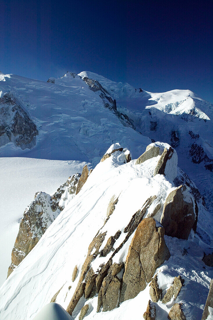 Aiguille du Midi (elev. 3842 meters). Winter. View of Mont-Blanc (elev.4810 meters). Chamonix. Mont-Blanc. Haute-Savoie. French Alps. France.