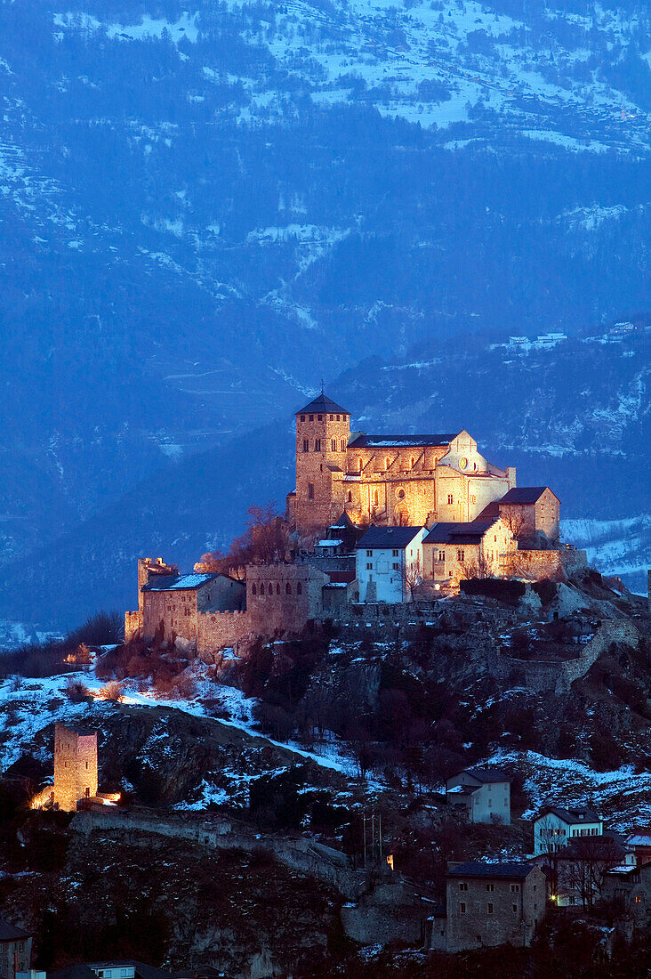 Basilique de Valere (12th century) & Town. Evening. Winter. Sion. Valais/Wallis. Switzerland.
