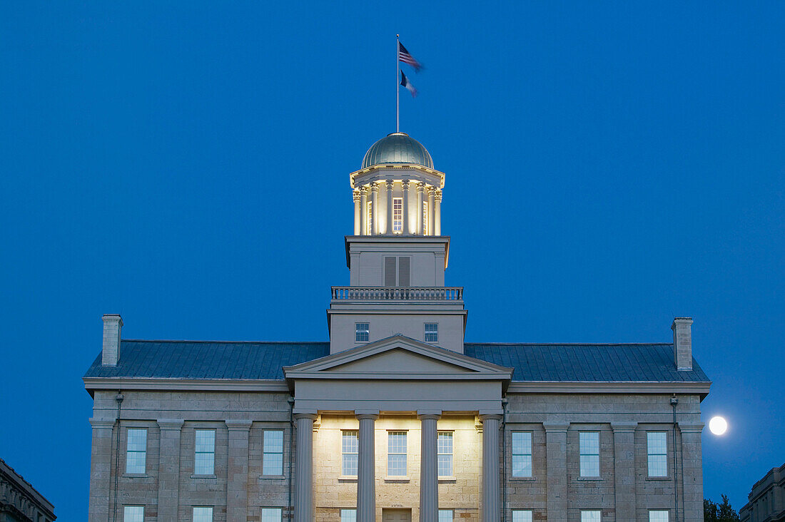 University of Iowa. Evening view of The Old Capitol with moonrise. Iowa City. Iowa. USA.