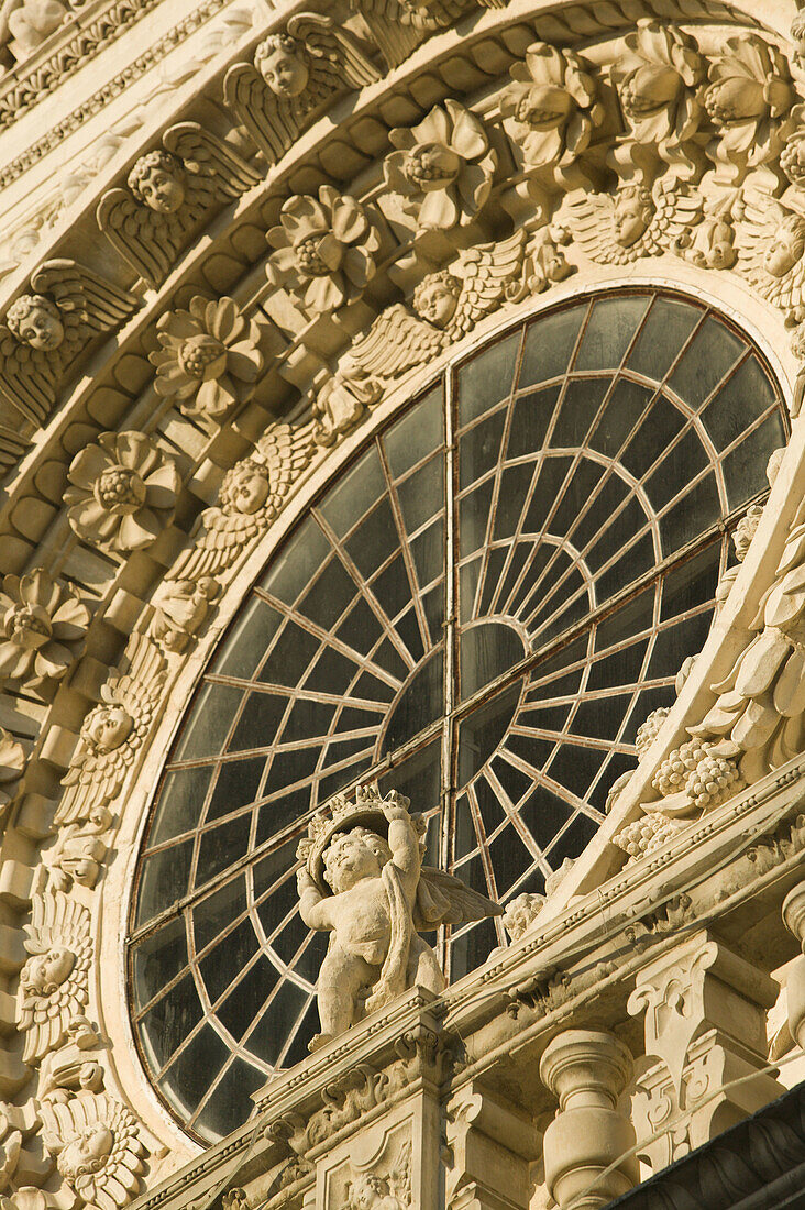 Baroque Window & Cherub of the Santa Croce Church (17th century), Lecce (Baroque Capital of Southern Italy). Puglia, Italy