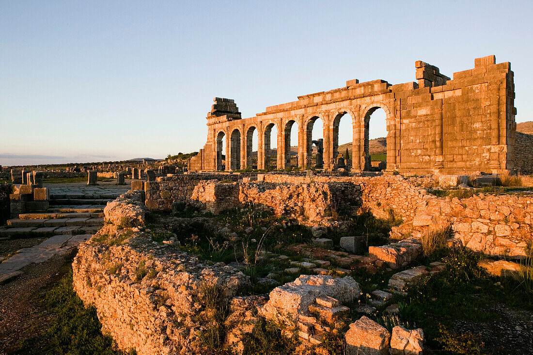 Morocco-Volubilis: Roman Town mostly dating to 2nd & 3rd c. AD/ Abandoned by Romans in 280 AD - Basilica and Capitol Area / Sunset