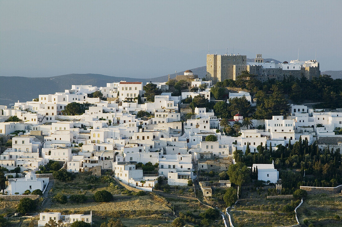 Hillside Town View and Monastery of St. John the Theologian (12th century). Sunset. Hora. Patmos Island. Dodecanese. Greece