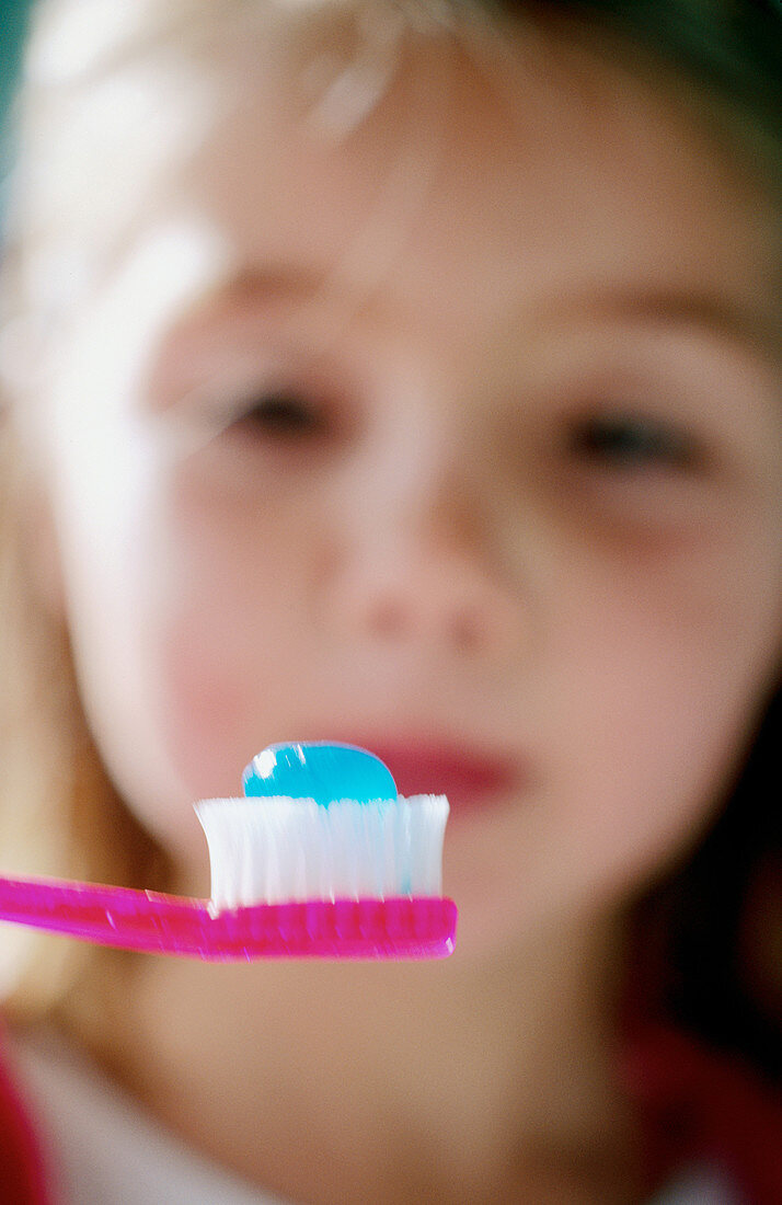 Girl getting ready to brush teeth