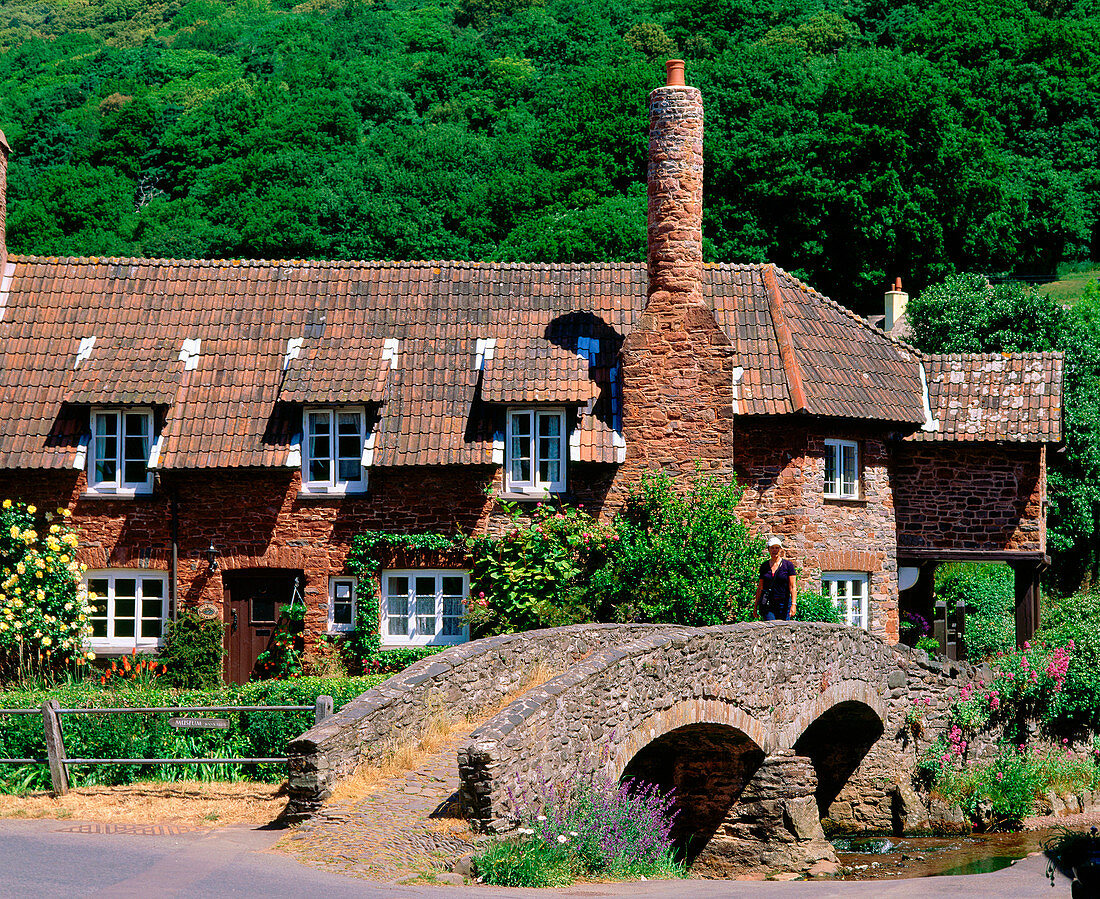 Cottage and Pack Horse Bridge. Allerford, Exmoor. Somerset. England