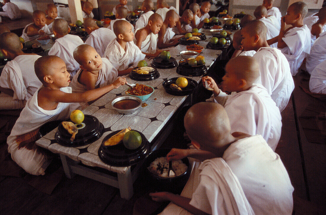 Mahgandhayon monastery. Novices lunch. Amarapura. Myanmar.