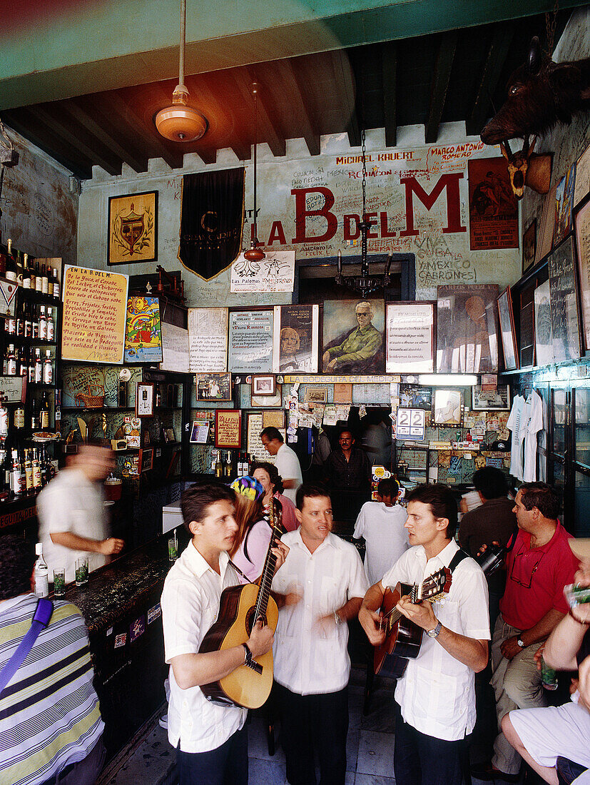 Cuba, Havana, Bodeguita del Medio. Hemingway s favorite bar. musicians playing