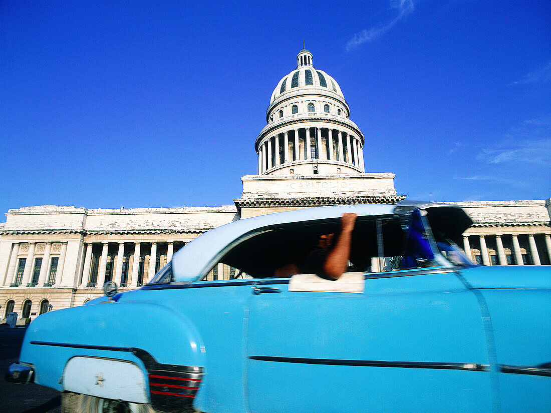 Cuba, Havana, Capitol. Old American car