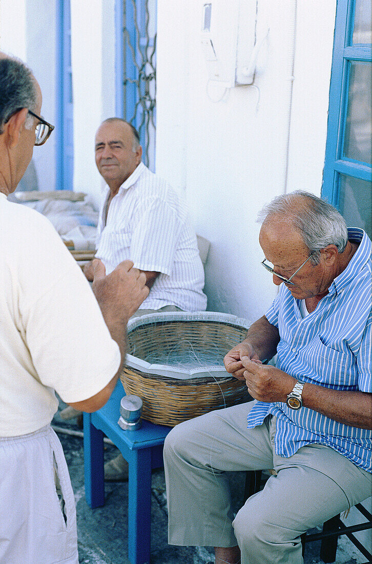 Greece, Cyclades, Paros, Naoussa. , Harbour , Fishermen