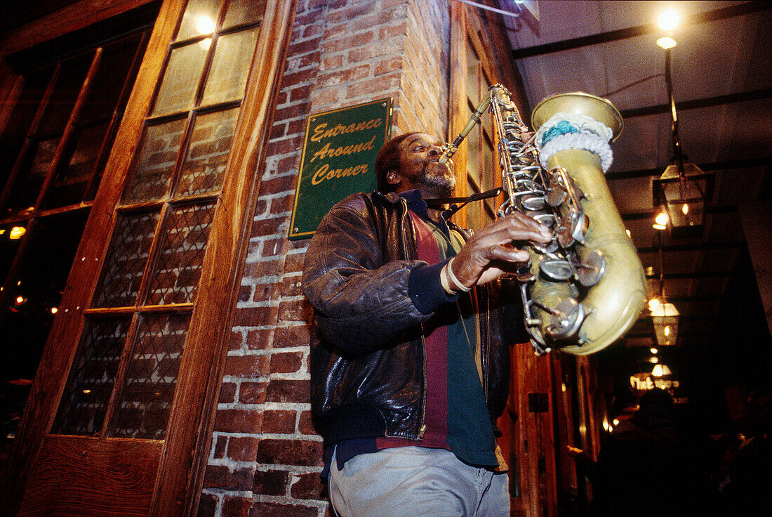 Jazzman playing saxo in Bourbon Street. New Orleans. Louisiana. USA