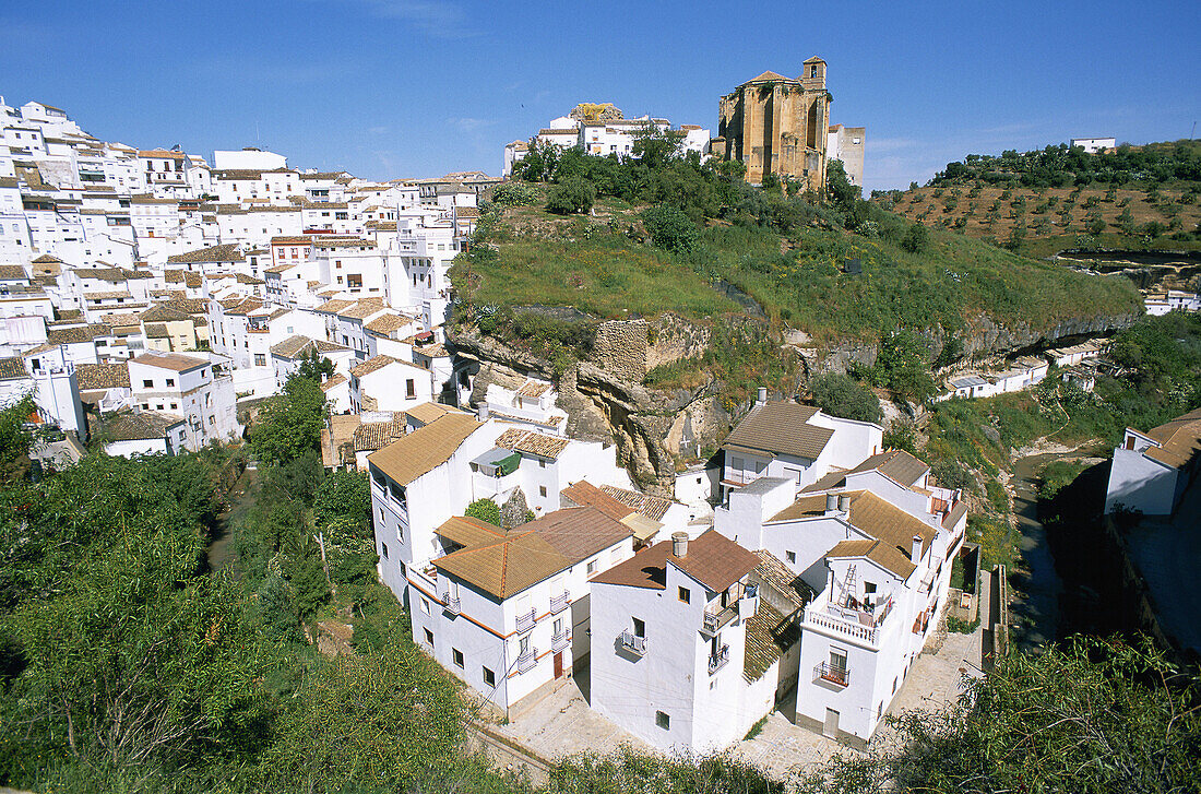 Setenil and the church Nuestra Señora de la Encarnación . XV Century. Setenil. Cádiz province. Andalusia. Spain