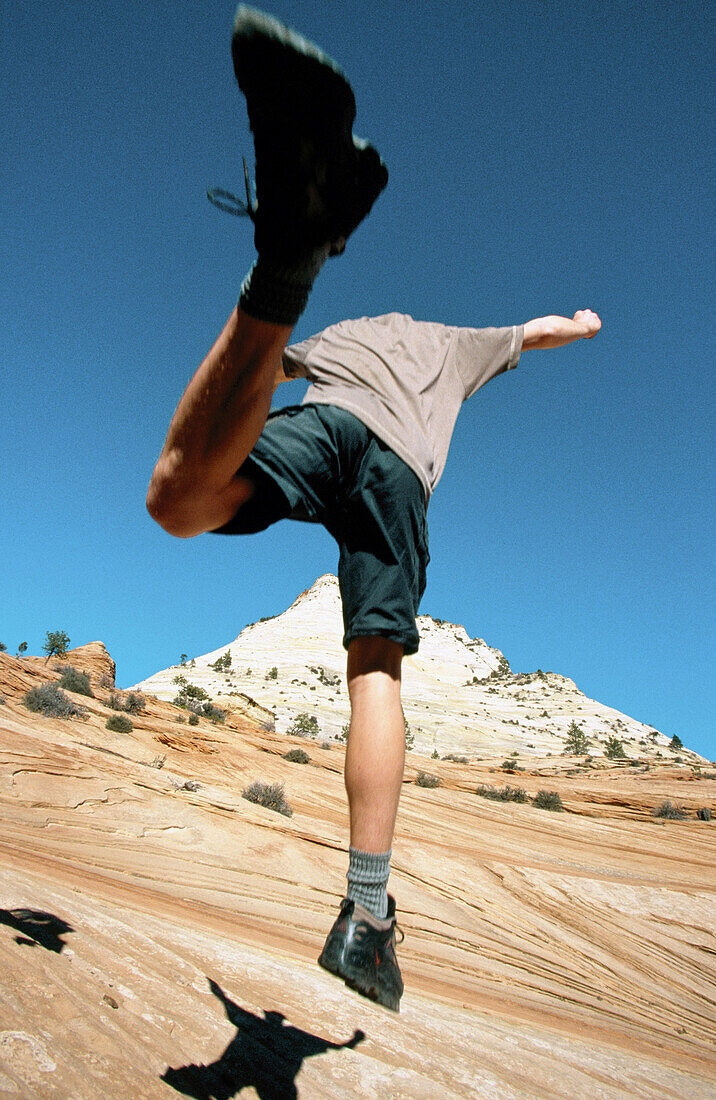 Hiker jumping. Zion National Park. Utah . USA