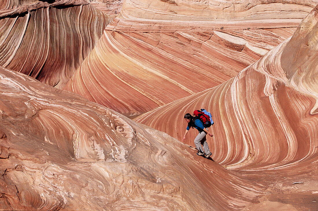 Hiking. The Wave , Coyote Buttes, Paria wilderness. Arizona. USA.