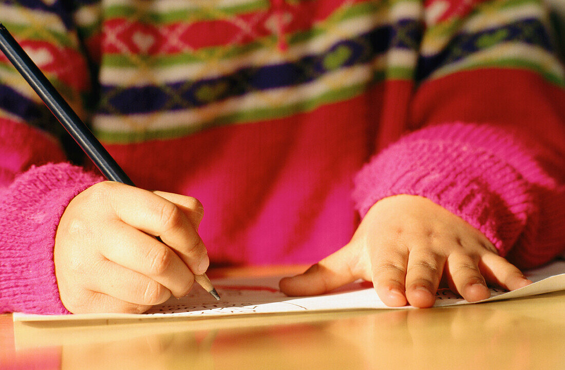 School child writing