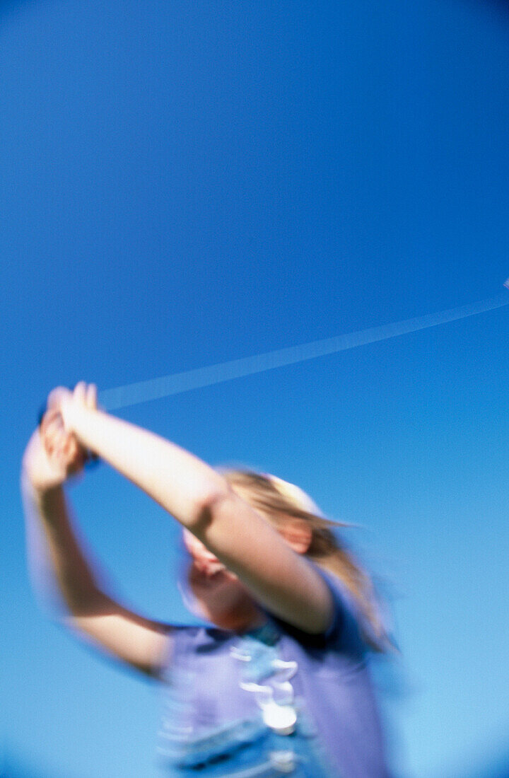 Child flying kite