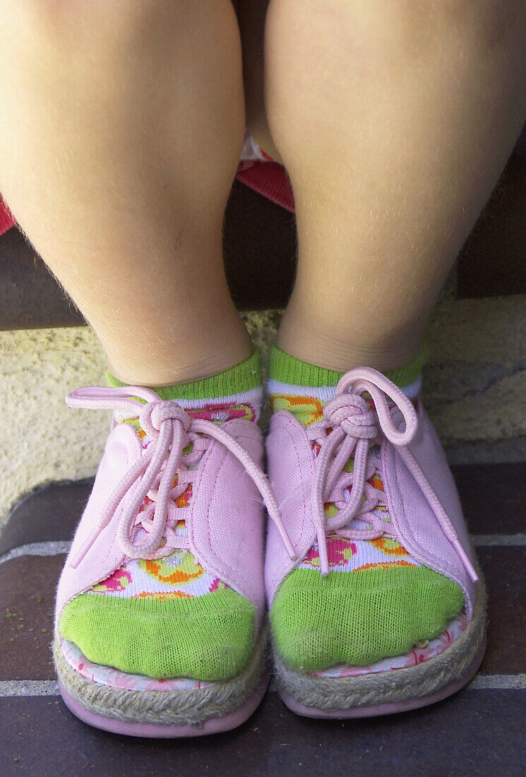 girl with green socks and sandals