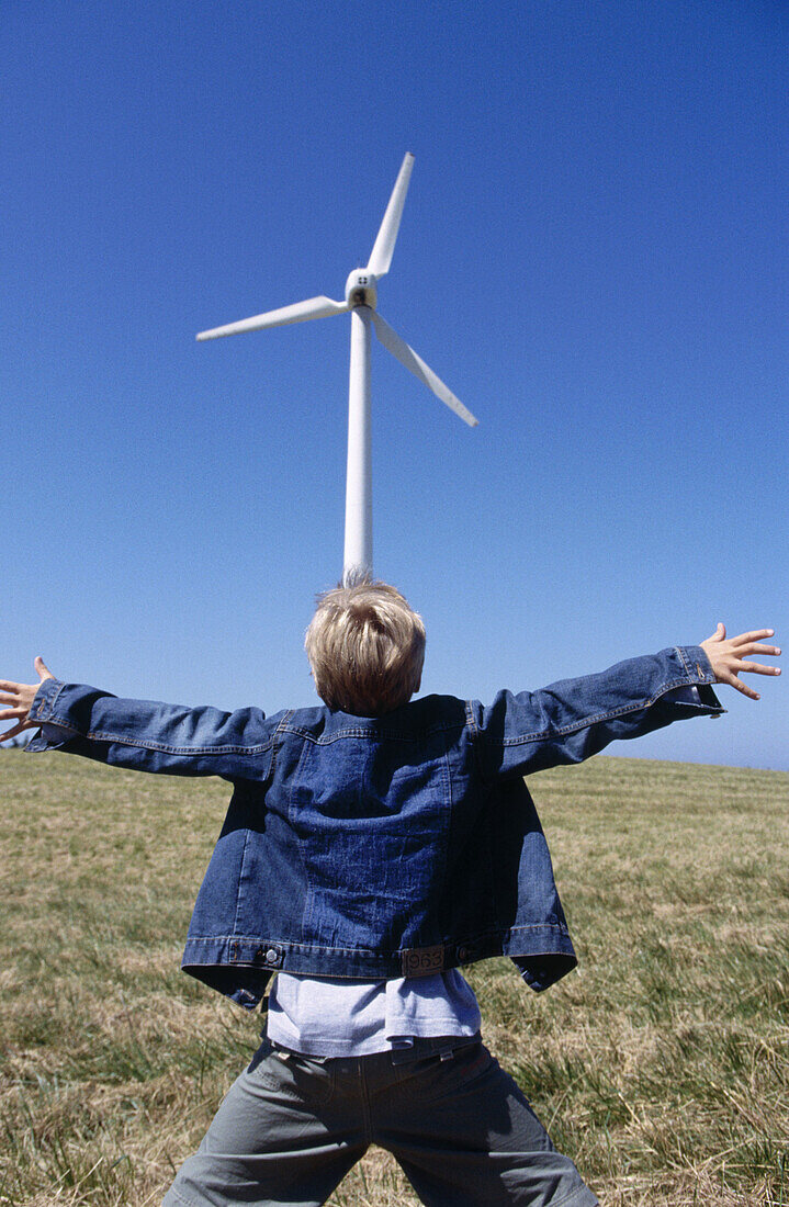 Color, Colour, Contemporary, Country, Countryside, Daytime, Denim, Ecology, Energy, Environment, Exterior, Human, Infantile, Jump, Jumping, Jumps, Kid, Kids, Knees-up, Male, One, One person, Open arm