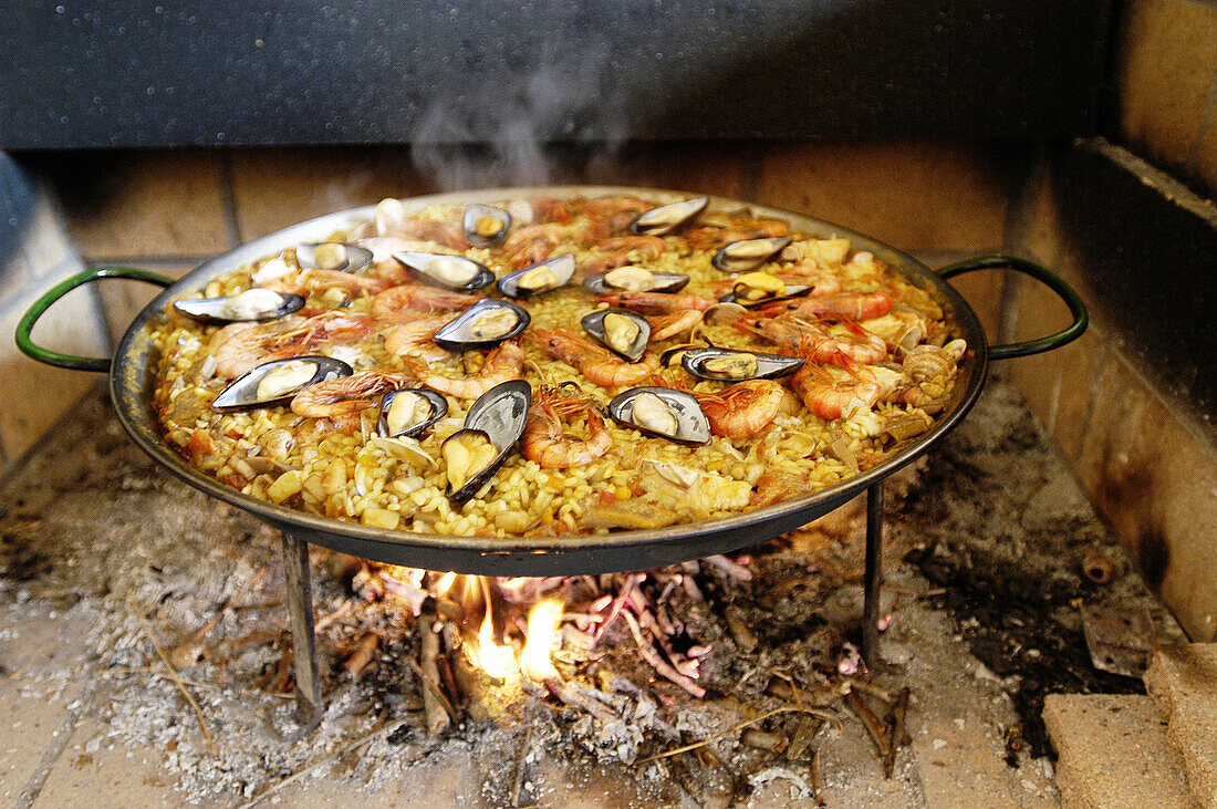 Paella cooked in firewood. Majorca. Balearic Islands. Spain