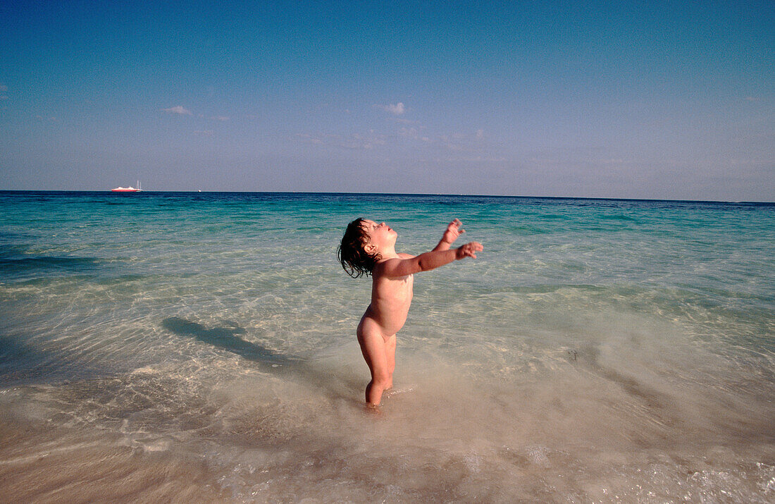 Child playing on beach