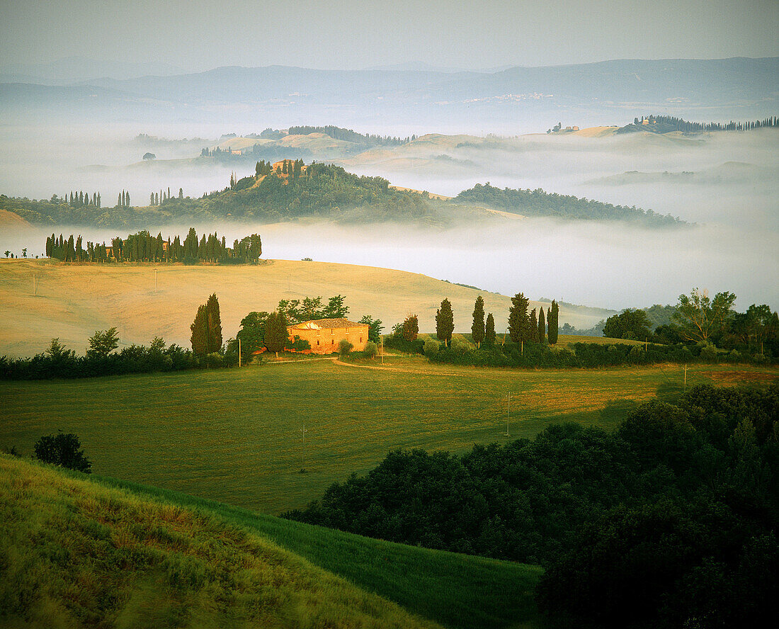 Val d Orcia, Tuscan landscape at sunrise. Italy