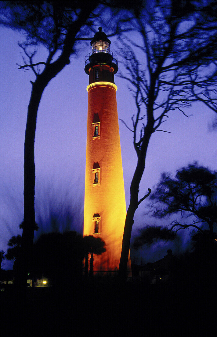 Ponce de Leon lighthouse illuminated at dusk. Ponce Inlet, Florida. USA
