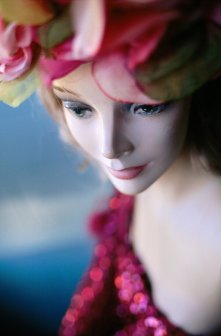 Mannequin with pink dress and hat