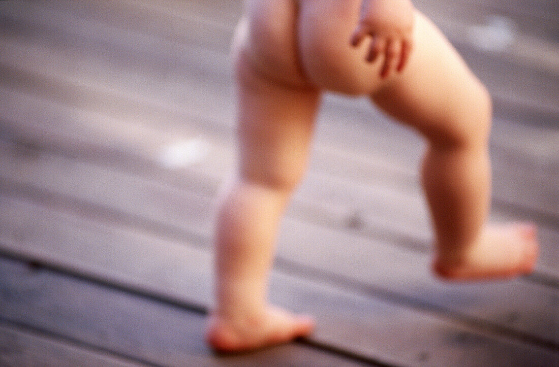 1 year old boy, walking naked