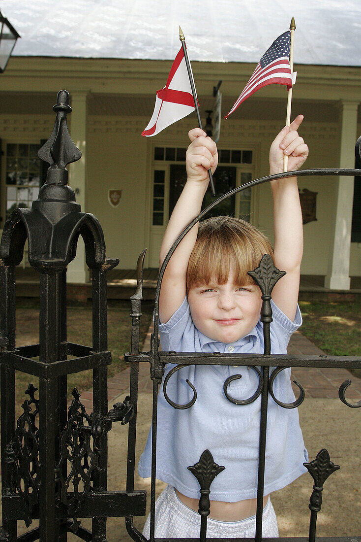 Alabama, Florence, Pope s Tavern Museum, 18th century stagecoach stop, boy, flags