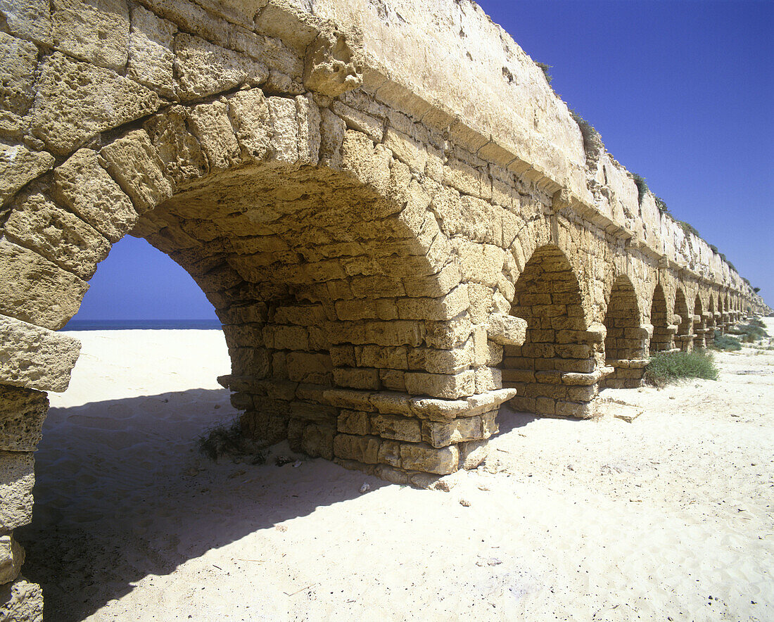 Roman aquaduct ruins, Caesaria national park, Israel.