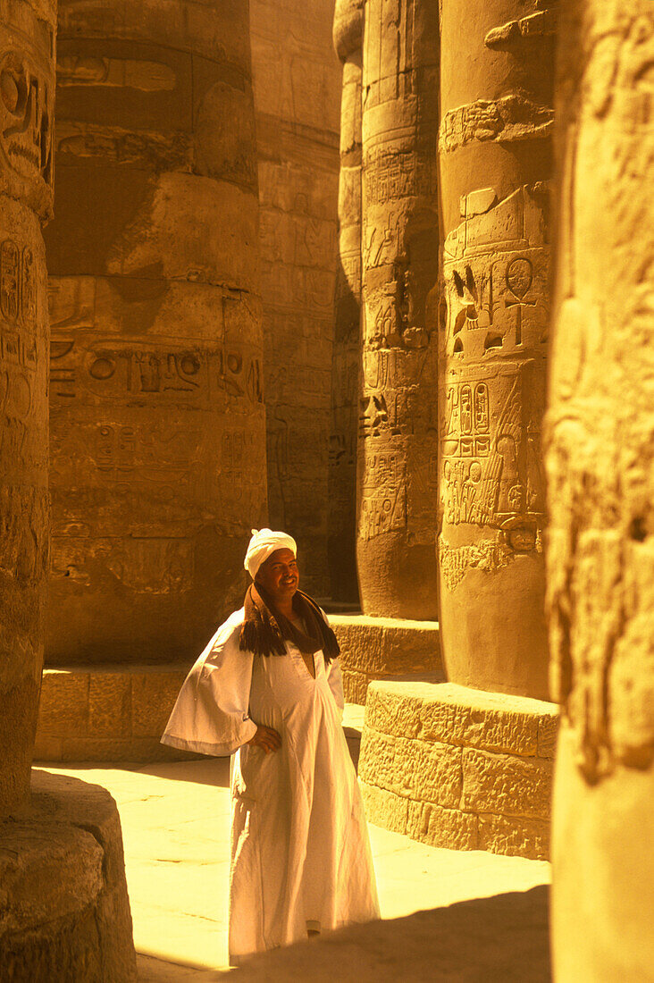 Guide, Hypostyle hall great temple of amun karnak, Luxor ruins, Egypt.