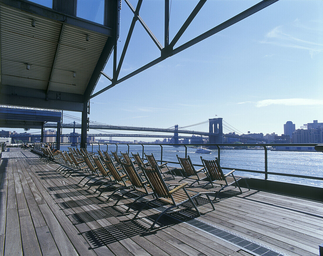 Pier 17, South Street seaport, East River bridges, Manhattan, New York, USA.